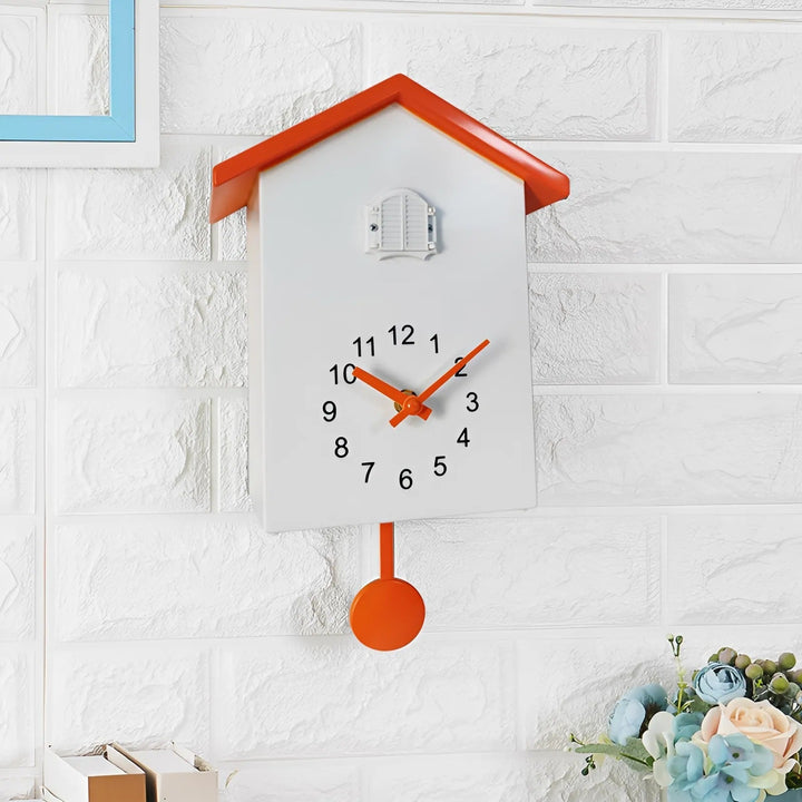"Minimalist cuckoo wall clock with sleek black and white finish, modern design, whimsical bird element, compact 20x25cm size.