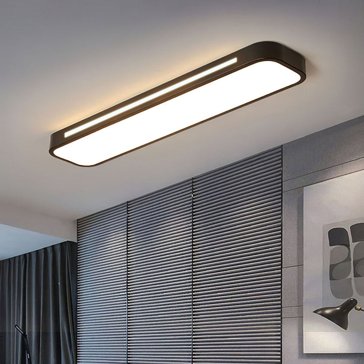 "Minimalist Nordic long LED ceiling light with sleek black finish and modern design for elegant interior lighting"