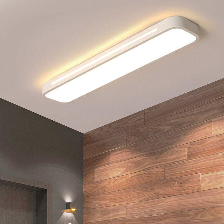 "Minimalist Nordic long LED ceiling light with sleek black finish and modern design for elegant interior lighting"