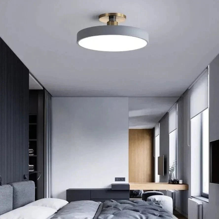 "Minimalist Nordic Macaron LED Ceiling Light in vibrant colors, round design, perfect for modern interior decor."