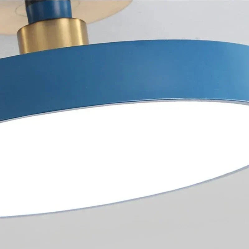 "Minimalist Nordic Macaron LED Ceiling Light in vibrant colors, round design, perfect for modern interior decor."