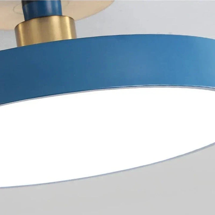 "Minimalist Nordic Macaron LED Ceiling Light in vibrant colors, round design, perfect for modern interior decor."