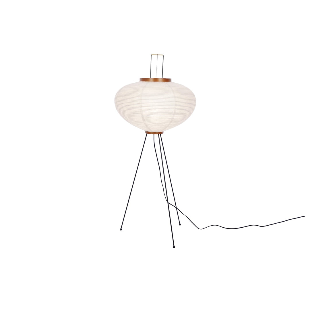 "Minimalist rice paper floor lamp with sleek metal frame and soft diffused light, perfect for creating a warm ambiance."
