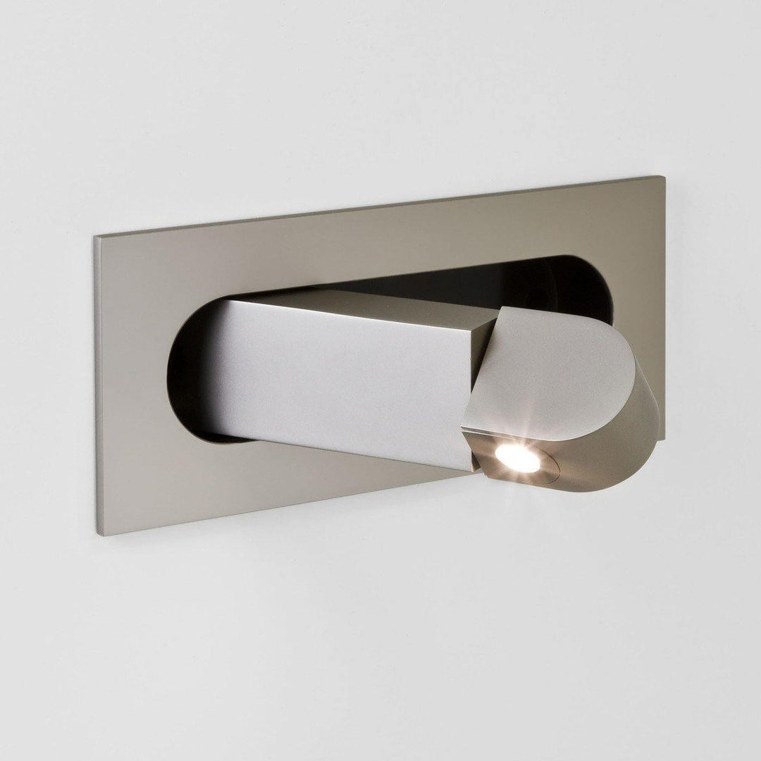 Modern adjustable LED bedside lamp in matte black with a sleek design, featuring an adjustable head for focused reading light