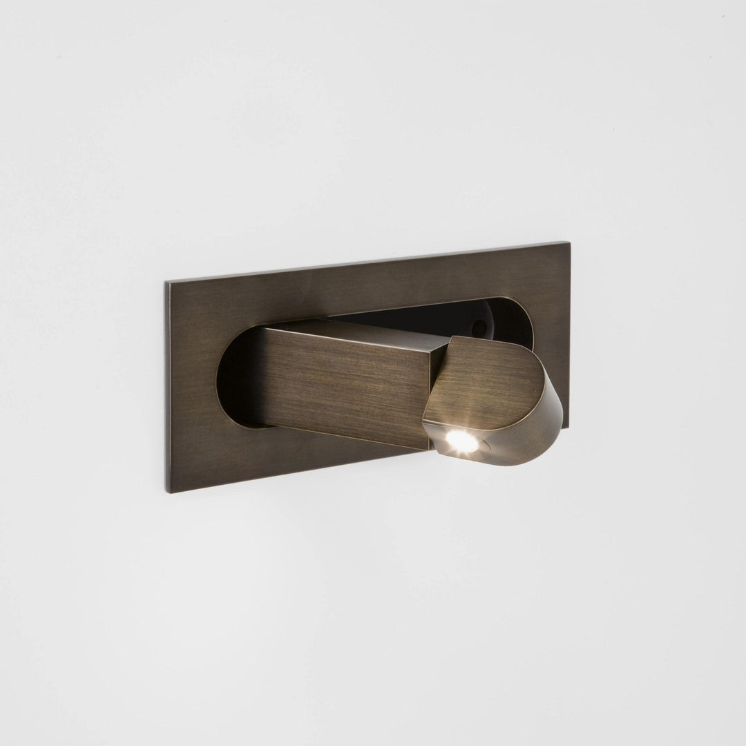 Modern adjustable LED bedside lamp in matte black with a sleek design, featuring an adjustable head for focused reading light
