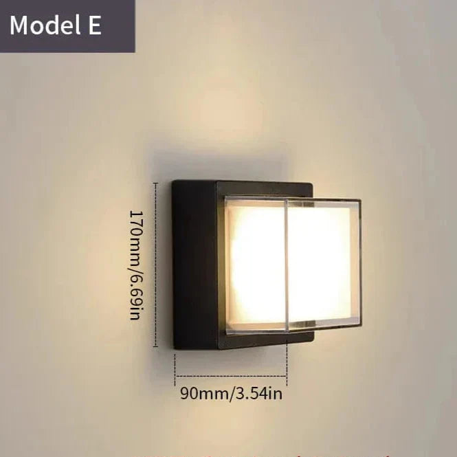 Modern black LED outdoor wall light with motion sensor, waterproof ABS, enhances security, suits balconies, porches, gardens.