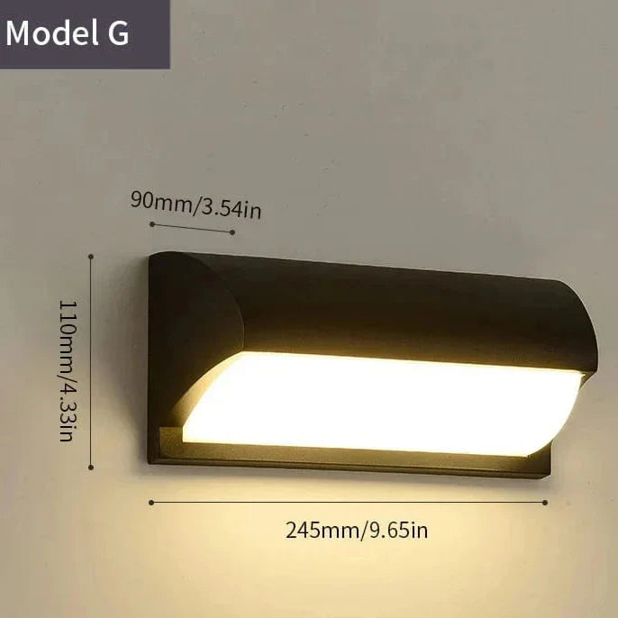 Modern black LED outdoor wall light with motion sensor, waterproof ABS, enhances security, suits balconies, porches, gardens.