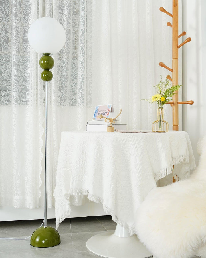 Modern Clavel metal floor lamp with glass accent, 59-inch height, sleek modern design, adds elegance to any room decor.