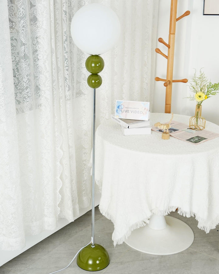 Modern Clavel metal floor lamp with glass accent, 59-inch height, sleek modern design, adds elegance to any room decor.