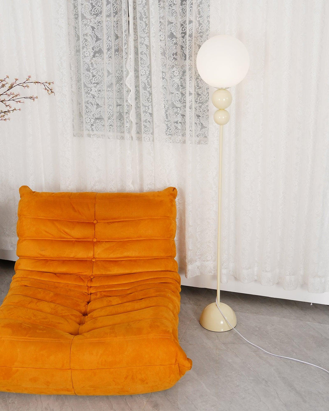 Modern Clavel metal floor lamp with glass accent, 59-inch height, sleek modern design, adds elegance to any room decor.
