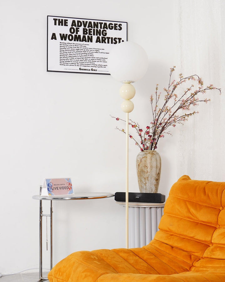Modern Clavel metal floor lamp with glass accent, 59-inch height, sleek modern design, adds elegance to any room decor.