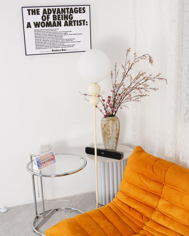 Modern Clavel metal floor lamp with glass accent, 59-inch height, sleek modern design, adds elegance to any room decor.