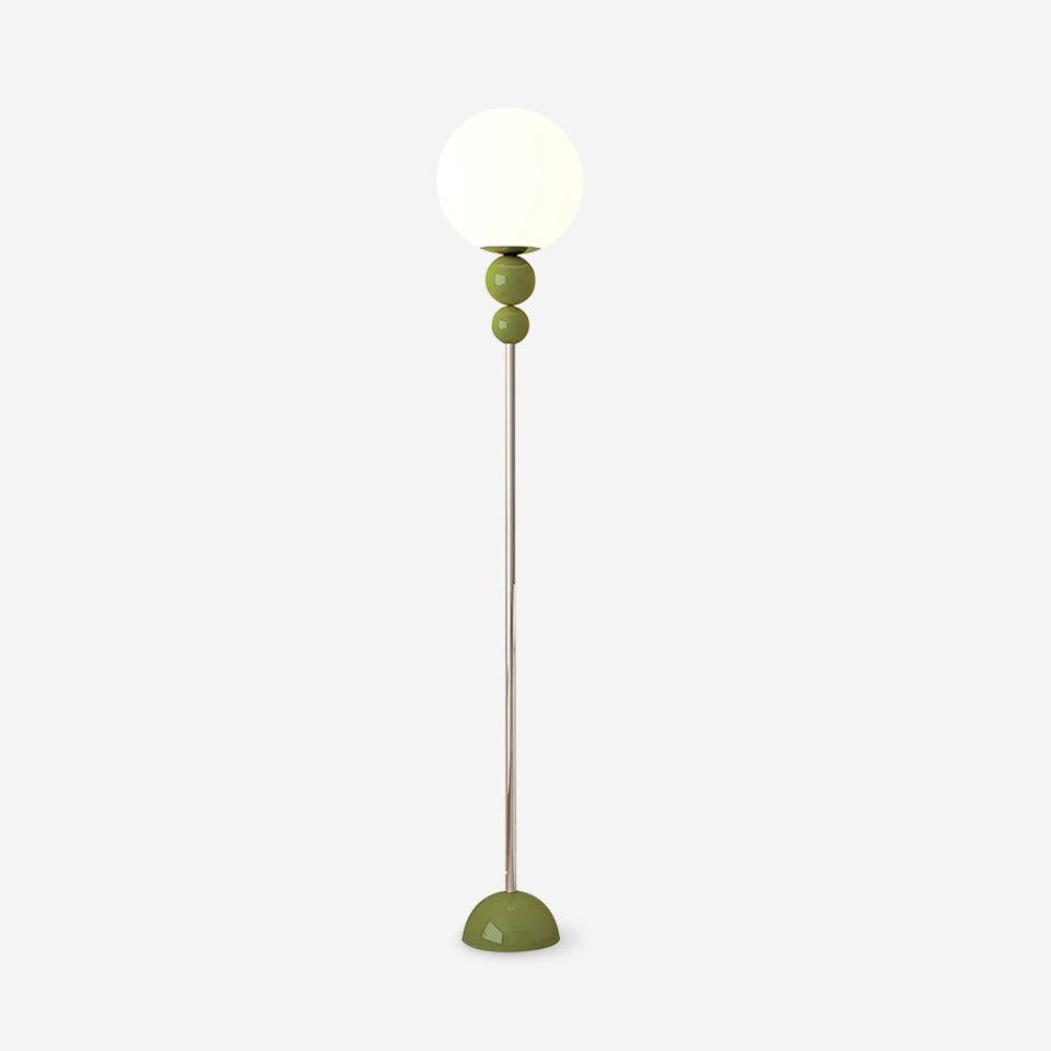 Modern Clavel metal floor lamp with glass accent, 59-inch height, sleek modern design, adds elegance to any room decor.