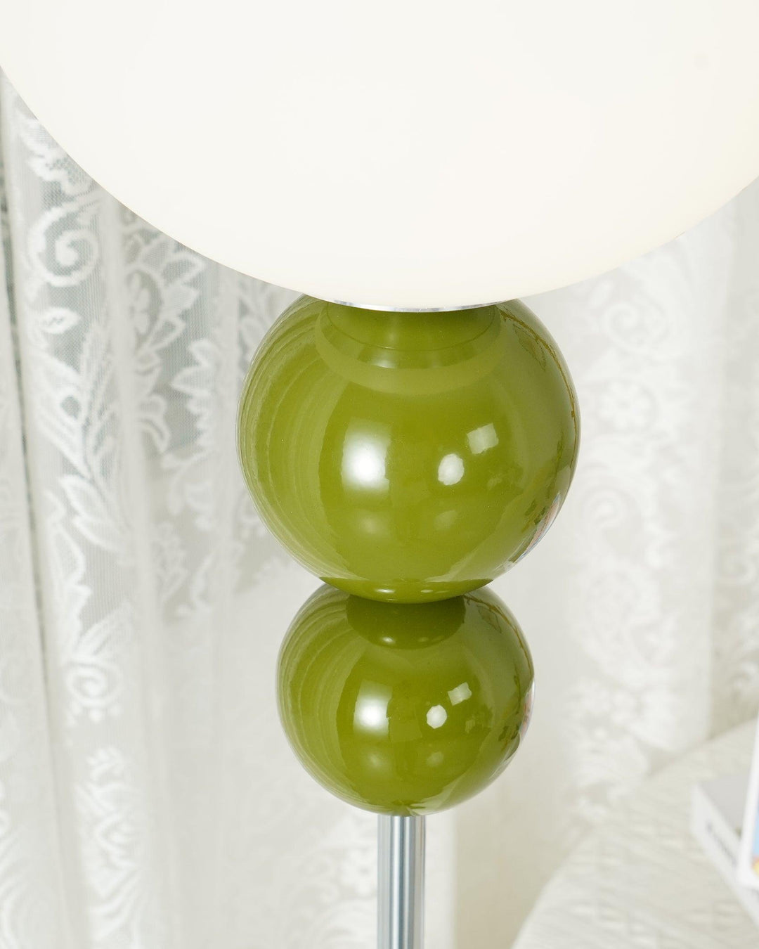 Modern Clavel metal floor lamp with glass accent, 59-inch height, sleek modern design, adds elegance to any room decor.