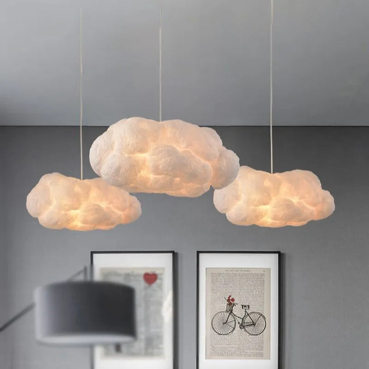 "Modern cloud-inspired pendant light with a soft ambient glow, featuring a dreamy design for elegant home decor spaces."