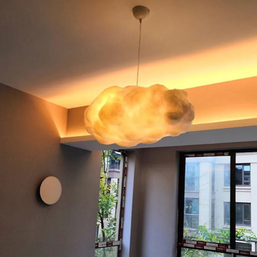 "Modern cloud-inspired pendant light with a soft ambient glow, featuring a dreamy design for elegant home decor spaces."