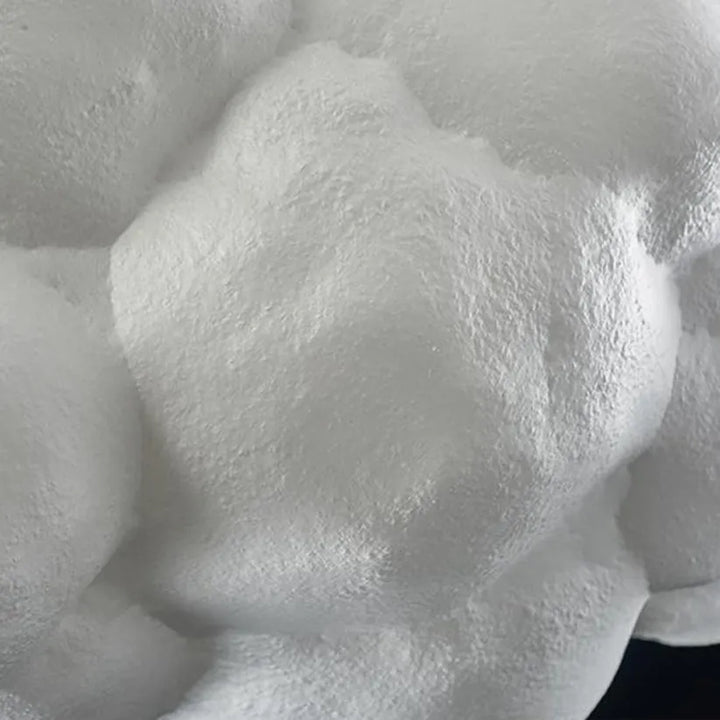 "Modern cloud-inspired pendant light with a soft ambient glow, featuring a dreamy design for elegant home decor spaces."