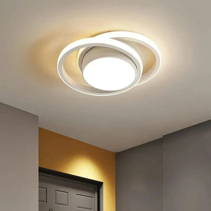 "Modern dimmable LED flush mount ceiling light, 3-colour options, sleek round design, fits low ceilings, energy-efficient"