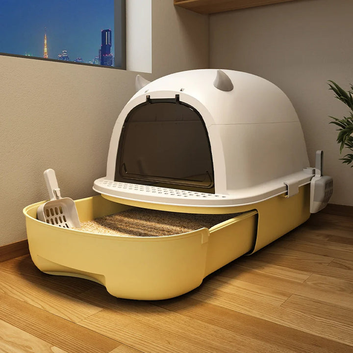 "Modern enclosed cat litter box with swing door, pull-out tray, high walls in grey and white, stylish pet supplies solution."