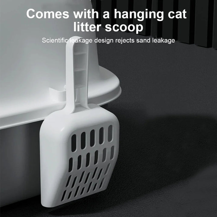 "Modern enclosed cat litter box with swing door, pull-out tray, high walls in grey and white, stylish pet supplies solution."