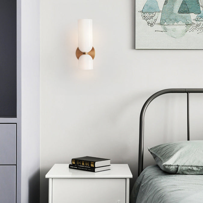 "Modern glass twin wall light with dual glass shades, ideal for stylish interiors, adding elegance and versatile illumination