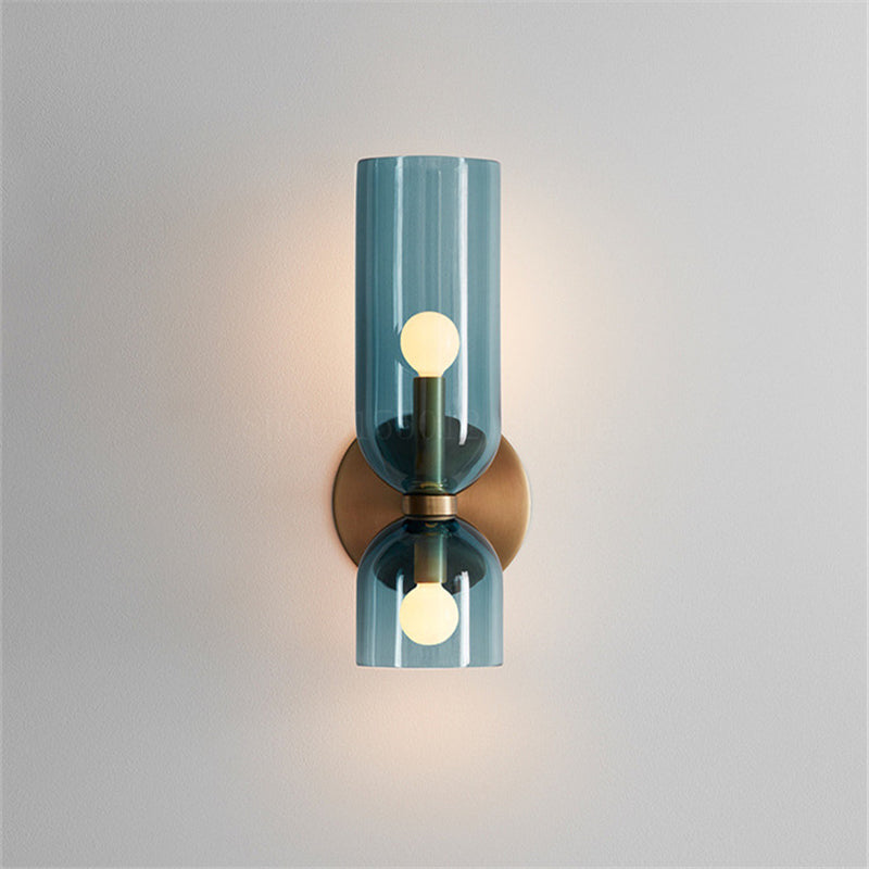 "Modern glass twin wall light with dual glass shades, ideal for stylish interiors, adding elegance and versatile illumination