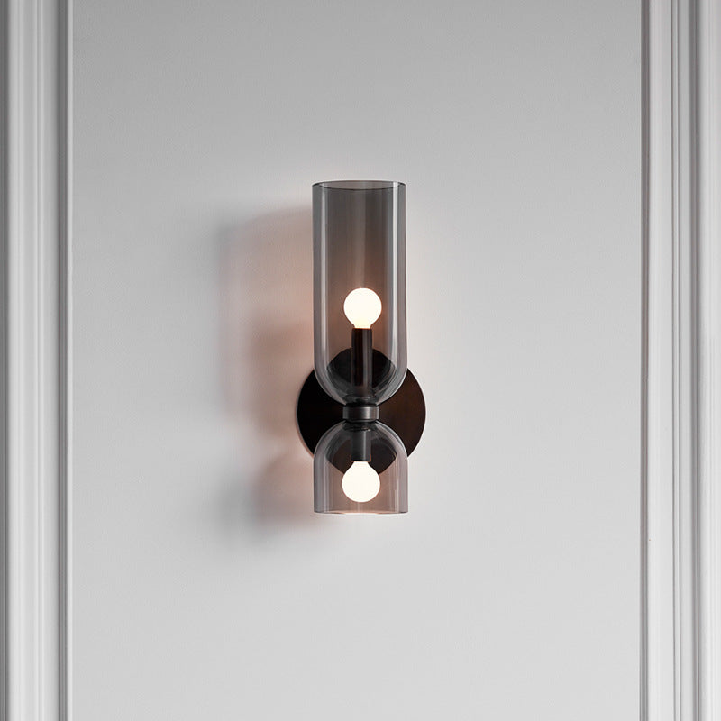 "Modern glass twin wall light with dual glass shades, ideal for stylish interiors, adding elegance and versatile illumination