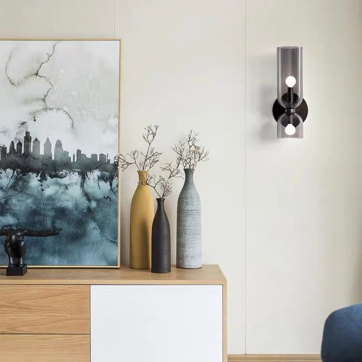 "Modern glass twin wall light with dual glass shades, ideal for stylish interiors, adding elegance and versatile illumination
