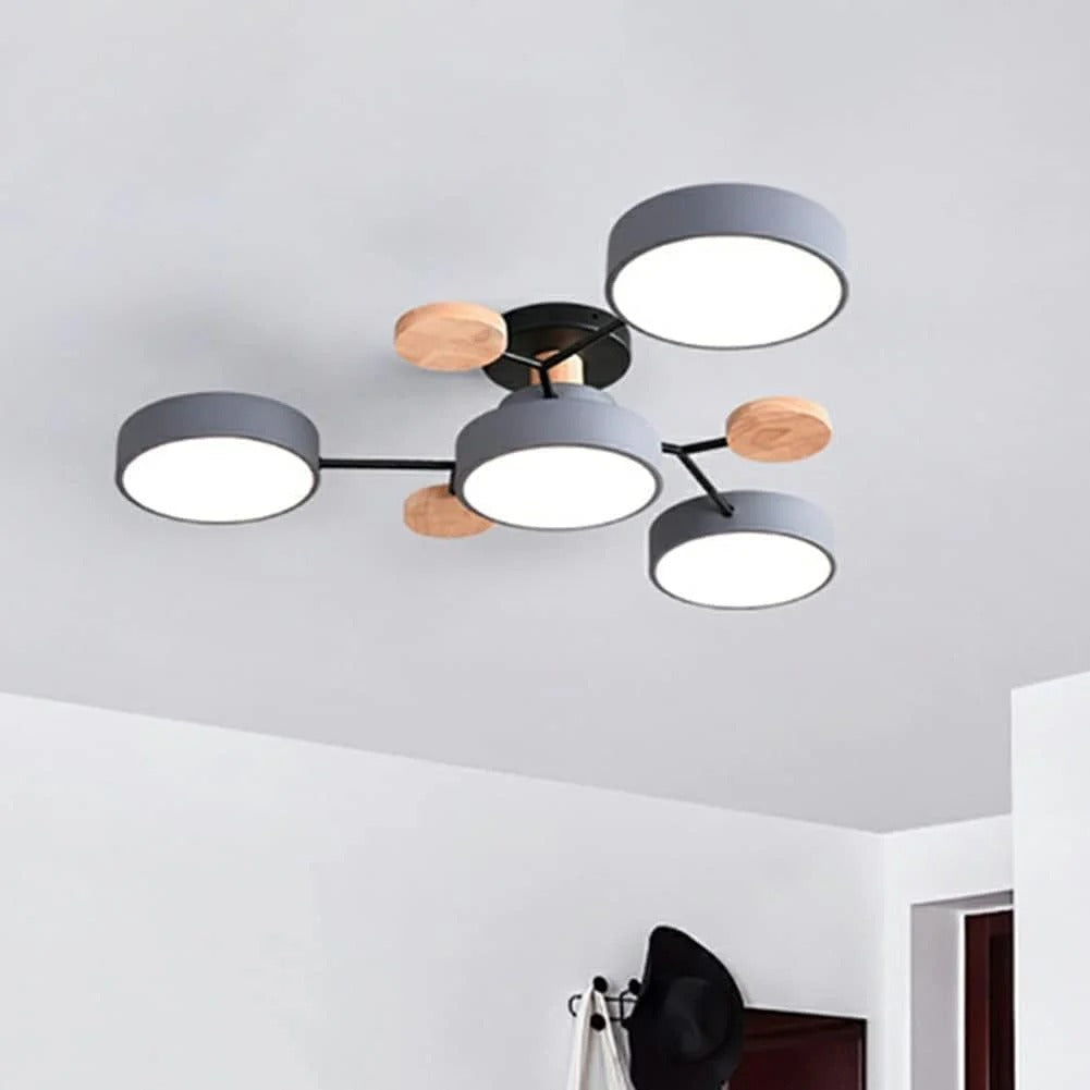 Modern LED ceiling light chandelier with sleek, minimalist design; iron and acrylic materials illuminate living rooms.