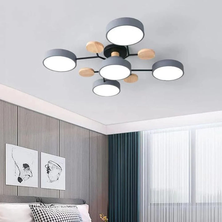 Modern LED ceiling light chandelier with sleek, minimalist design; iron and acrylic materials illuminate living rooms.