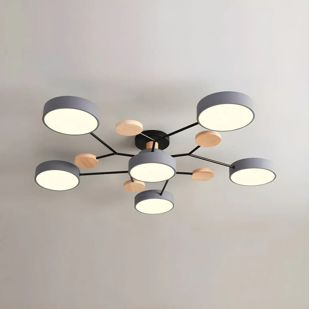 Modern LED ceiling light chandelier with sleek, minimalist design; iron and acrylic materials illuminate living rooms.