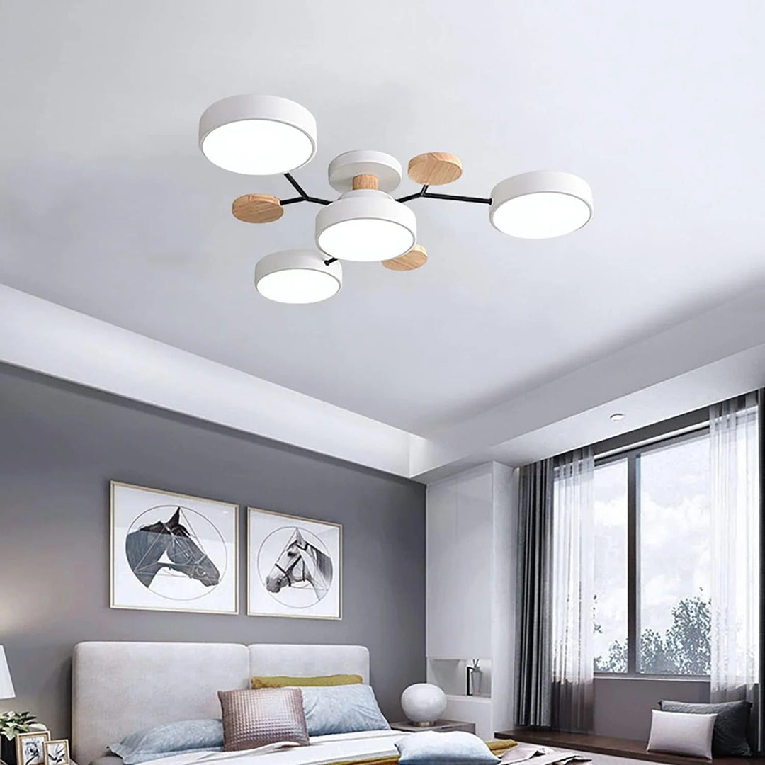 Modern LED ceiling light chandelier with sleek, minimalist design; iron and acrylic materials illuminate living rooms.