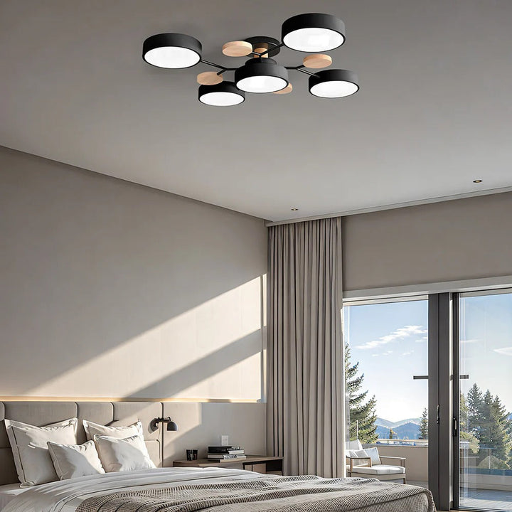 Modern LED ceiling light chandelier with sleek, minimalist design; iron and acrylic materials illuminate living rooms.