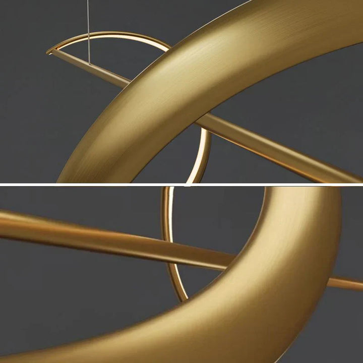 Modern LED pendant lamp with wavy metal and acrylic design, providing elegant illumination for stylish interior decor.
