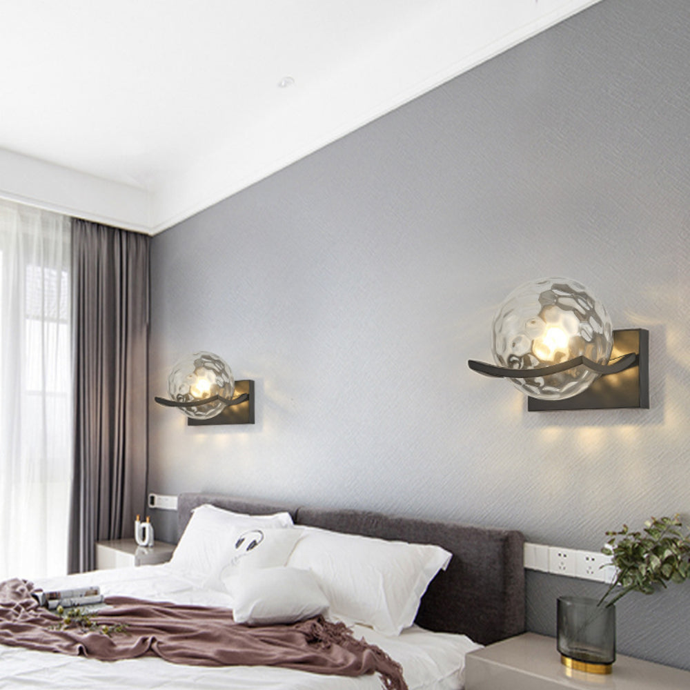 "Modern LED wall lamp with sleek glass finish, ideal for contemporary home decor and energy-efficient lighting."