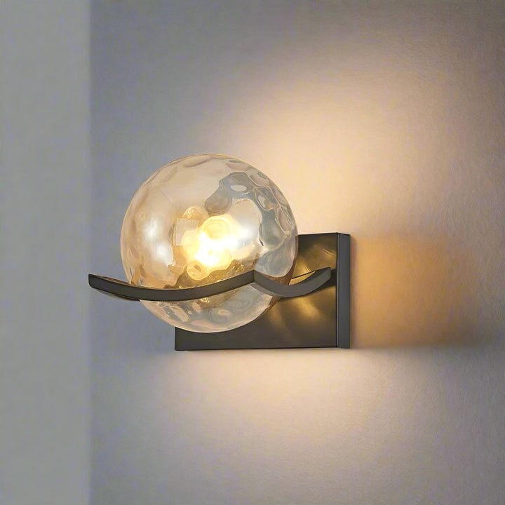 "Modern LED wall lamp with sleek glass finish, ideal for contemporary home decor and energy-efficient lighting."