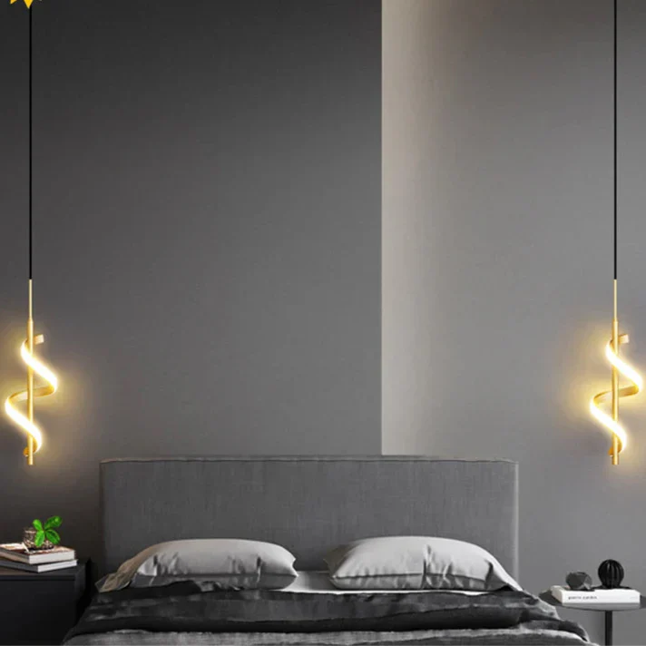 Modern LED wall sconce with adjustable gold arm and copper finish, ideal for ambient lighting in living rooms and bedrooms.