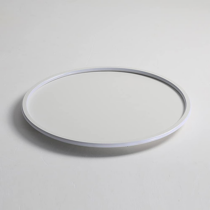 "Modern Nordic LED Ceiling Light with minimalist round flush mount design, providing soft even illumination for modern interi