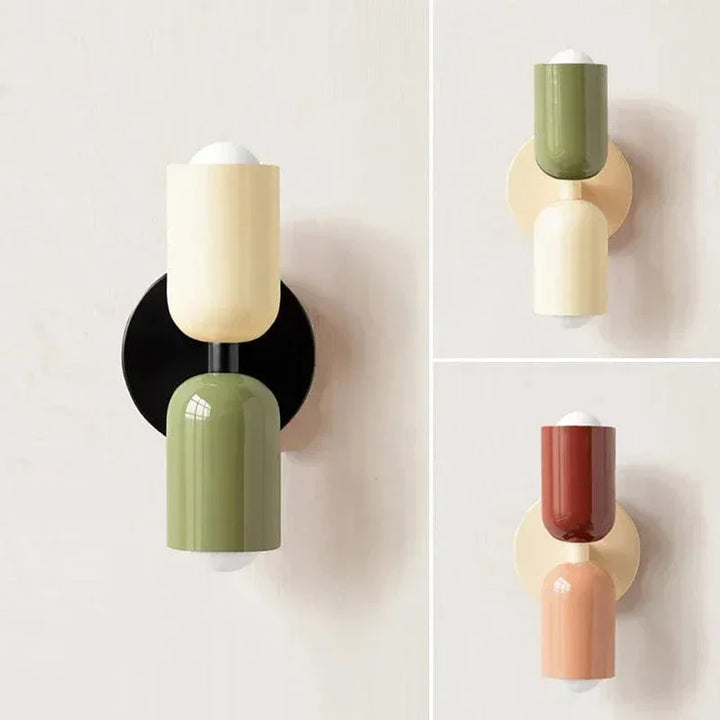 "Modern Nordic wall lamp with colorful metal design, dual light source, and sleek finish for contemporary interiors."