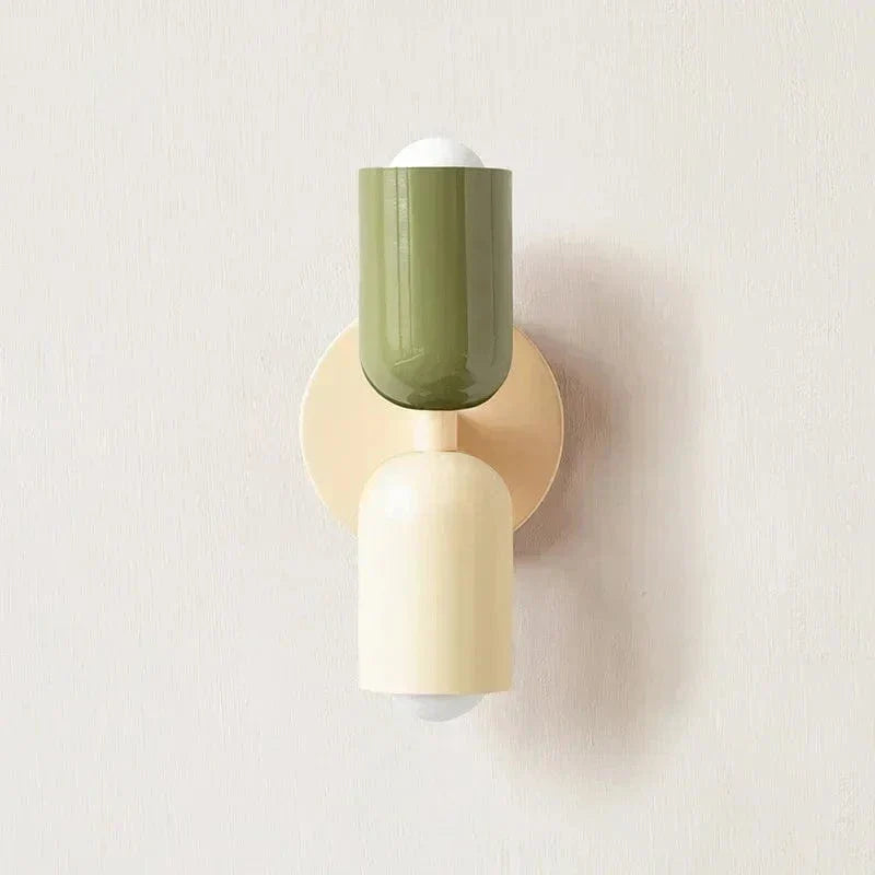 "Modern Nordic wall lamp with colorful metal design, dual light source, and sleek finish for contemporary interiors."