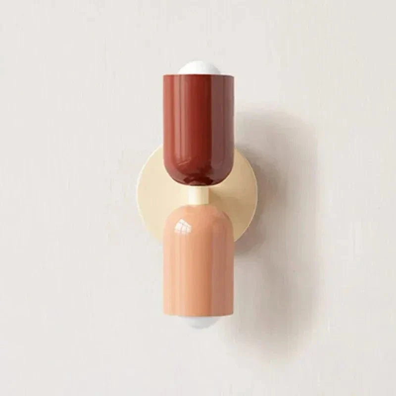 "Modern Nordic wall lamp with colorful metal design, dual light source, and sleek finish for contemporary interiors."