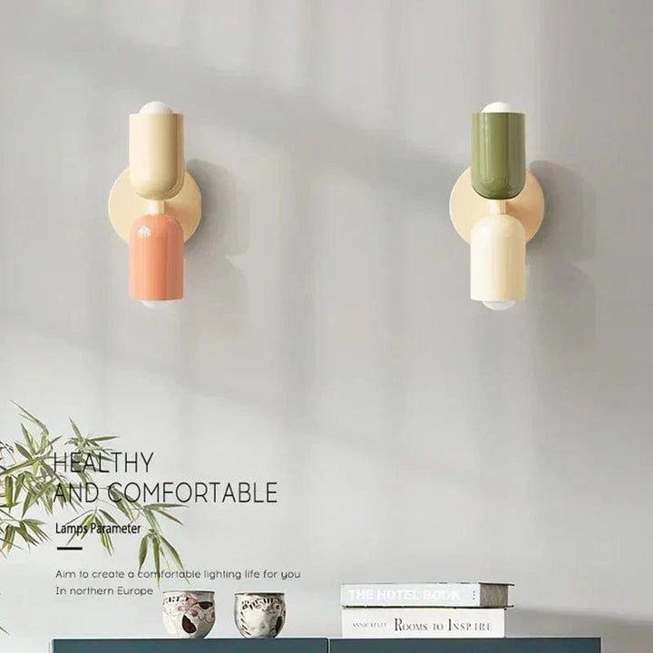 "Modern Nordic wall lamp with colorful metal design, dual light source, and sleek finish for contemporary interiors."
