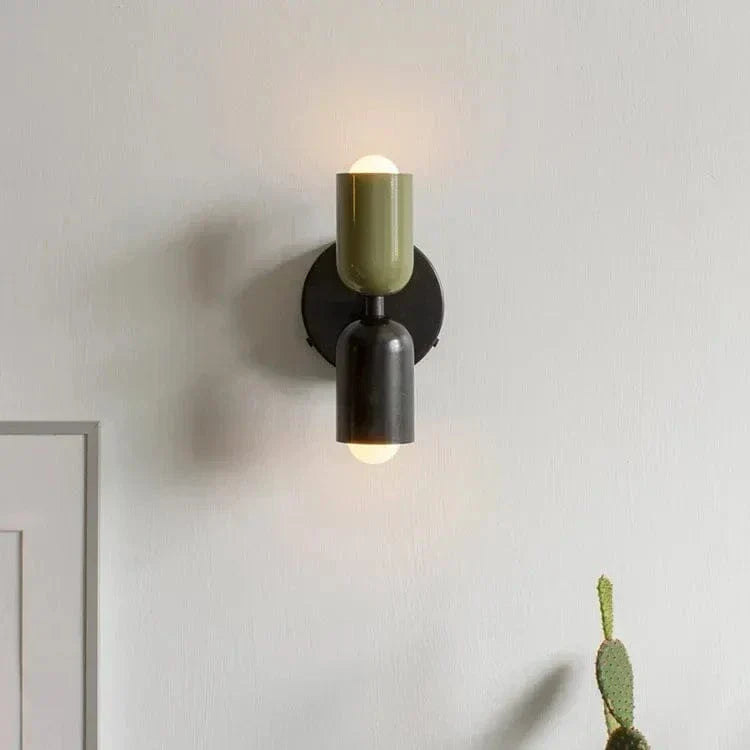 "Modern Nordic wall lamp with colorful metal design, dual light source, and sleek finish for contemporary interiors."