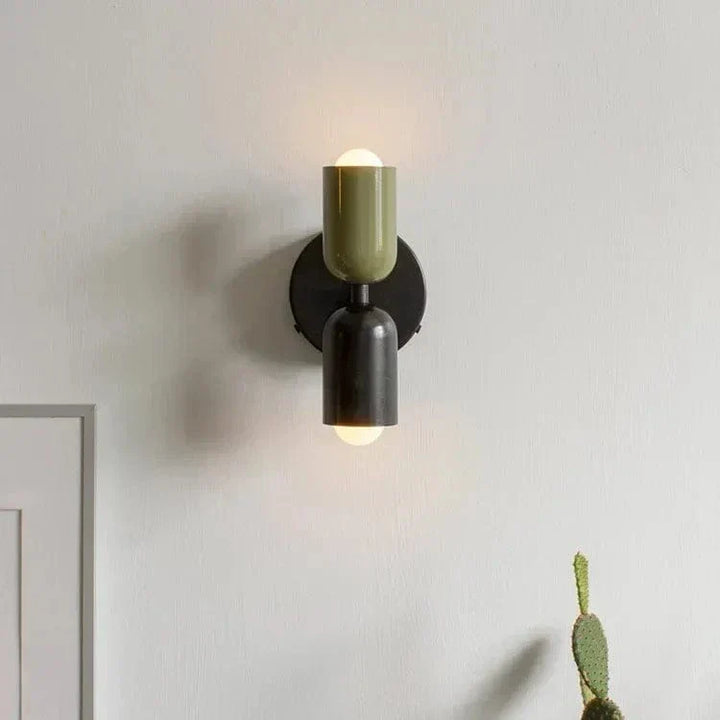 "Modern Nordic wall lamp with colorful metal design, dual light source, and sleek finish for contemporary interiors."