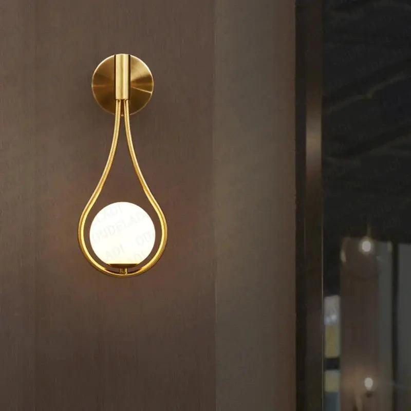 "Modern Nordic wall lamp with elegant gold and black finish, featuring minimalist design and clean lines for any room decor."