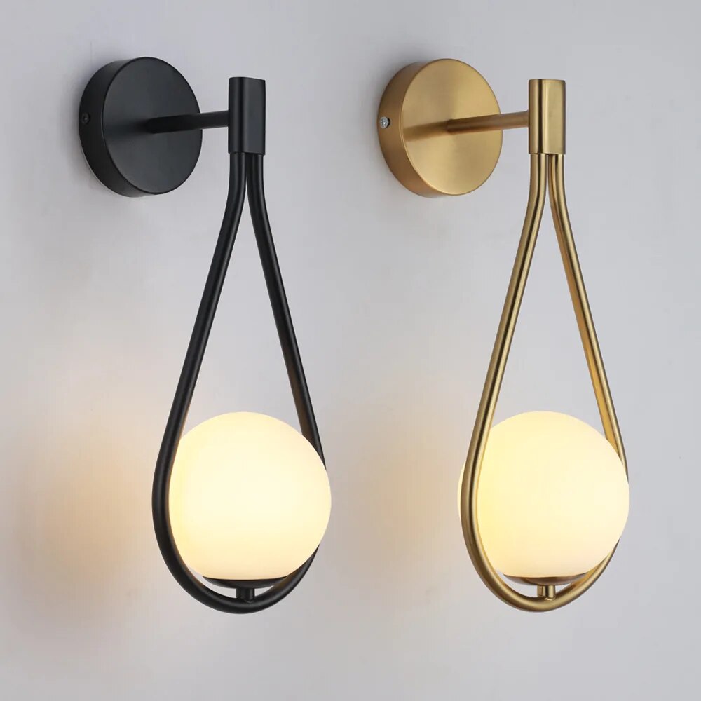 "Modern Nordic wall lamp with elegant gold and black finish, featuring minimalist design and clean lines for any room decor."
