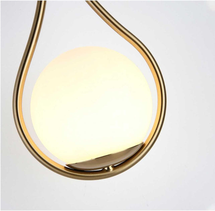 "Modern Nordic wall lamp with elegant gold and black finish, featuring minimalist design and clean lines for any room decor."