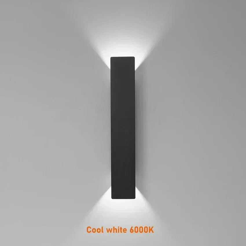 Modern outdoor LED wall light, black or white finish, IP65 waterproof, up/down lighting, enhances exterior decor.