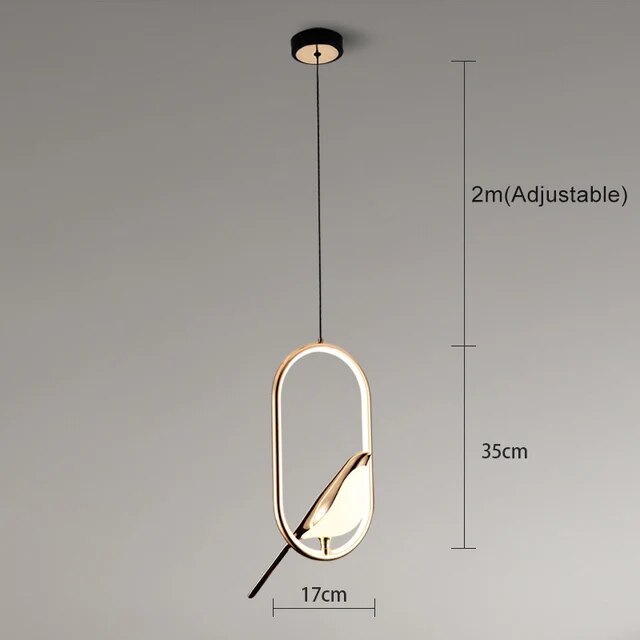 "Modern pendant light with elegant golden bird design in a minimalist frame, ideal for serene home environments."