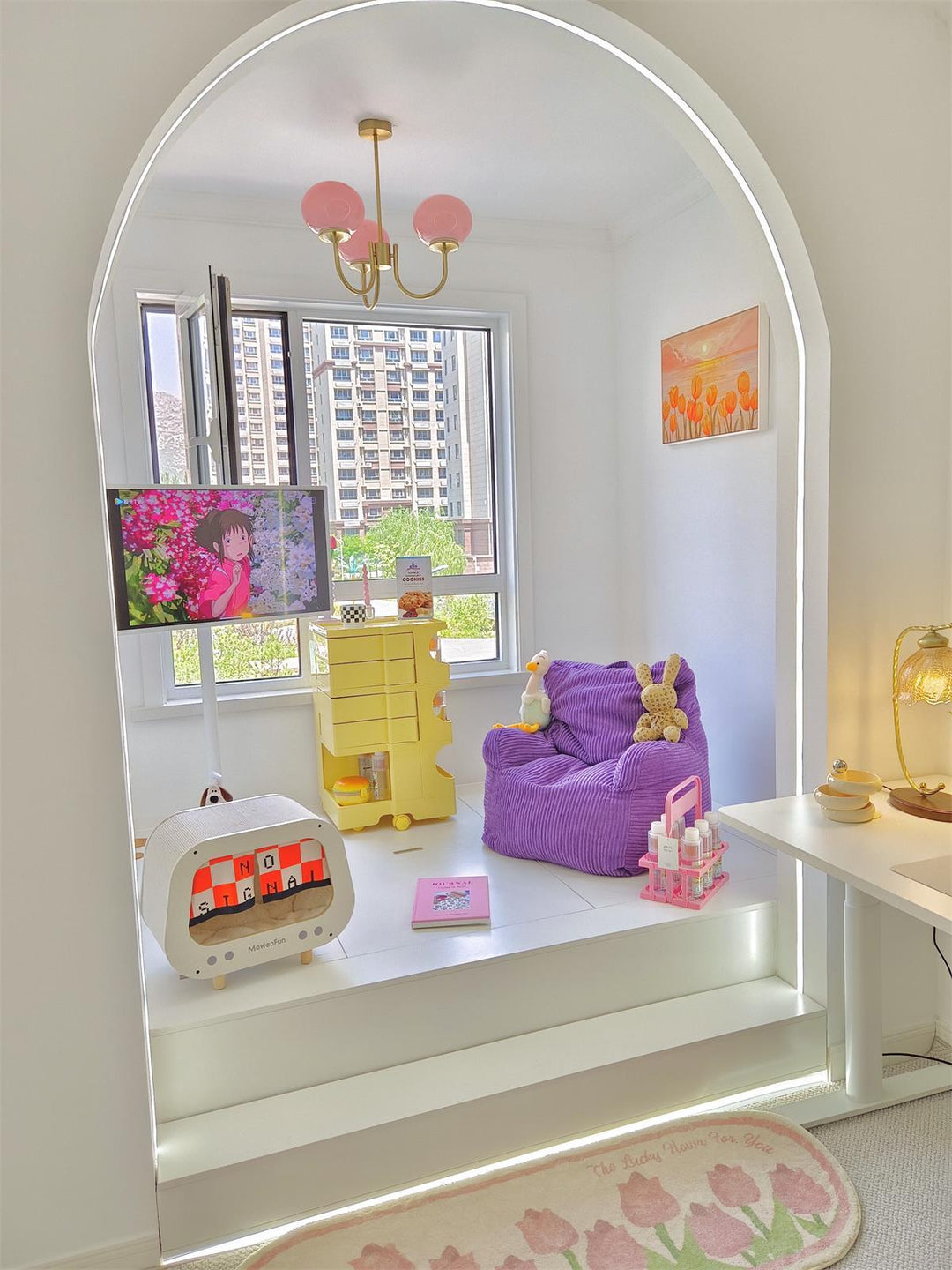 Modern pink and gold chandelier with elegant glass shades, ideal ceiling light fixture for chic home decor and illumination.